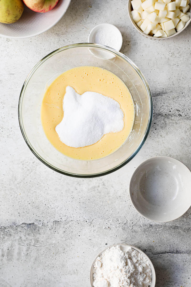 Overhead shot of the glass bowl with the batter plus the sugar