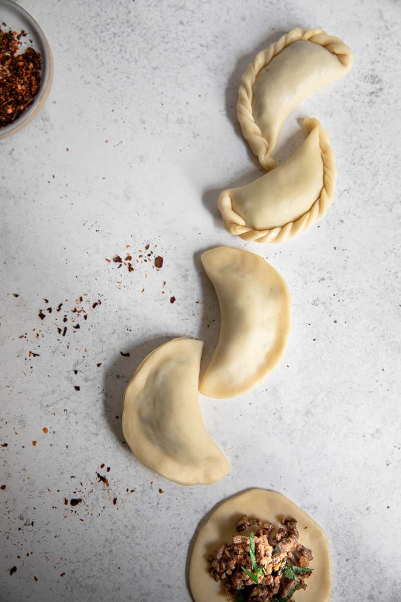 Fold and seal the beef empanadas