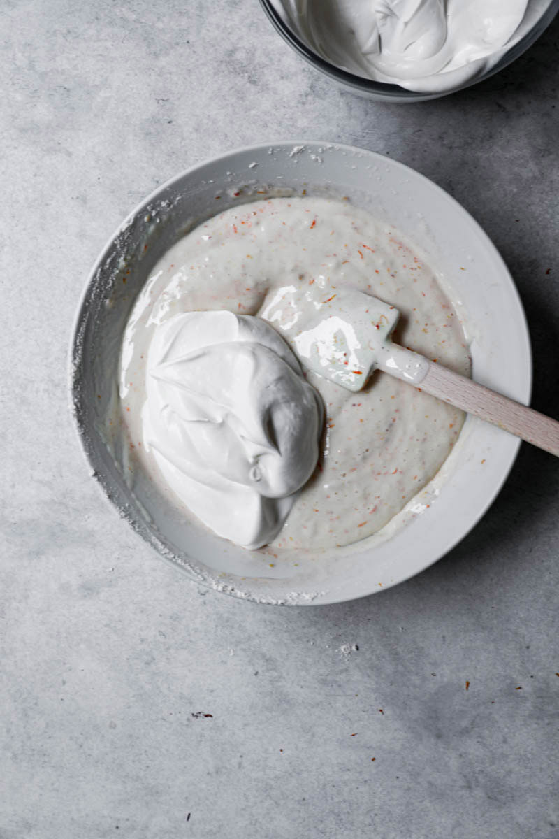 Blood orange cake batter with the added whipped cream on top.