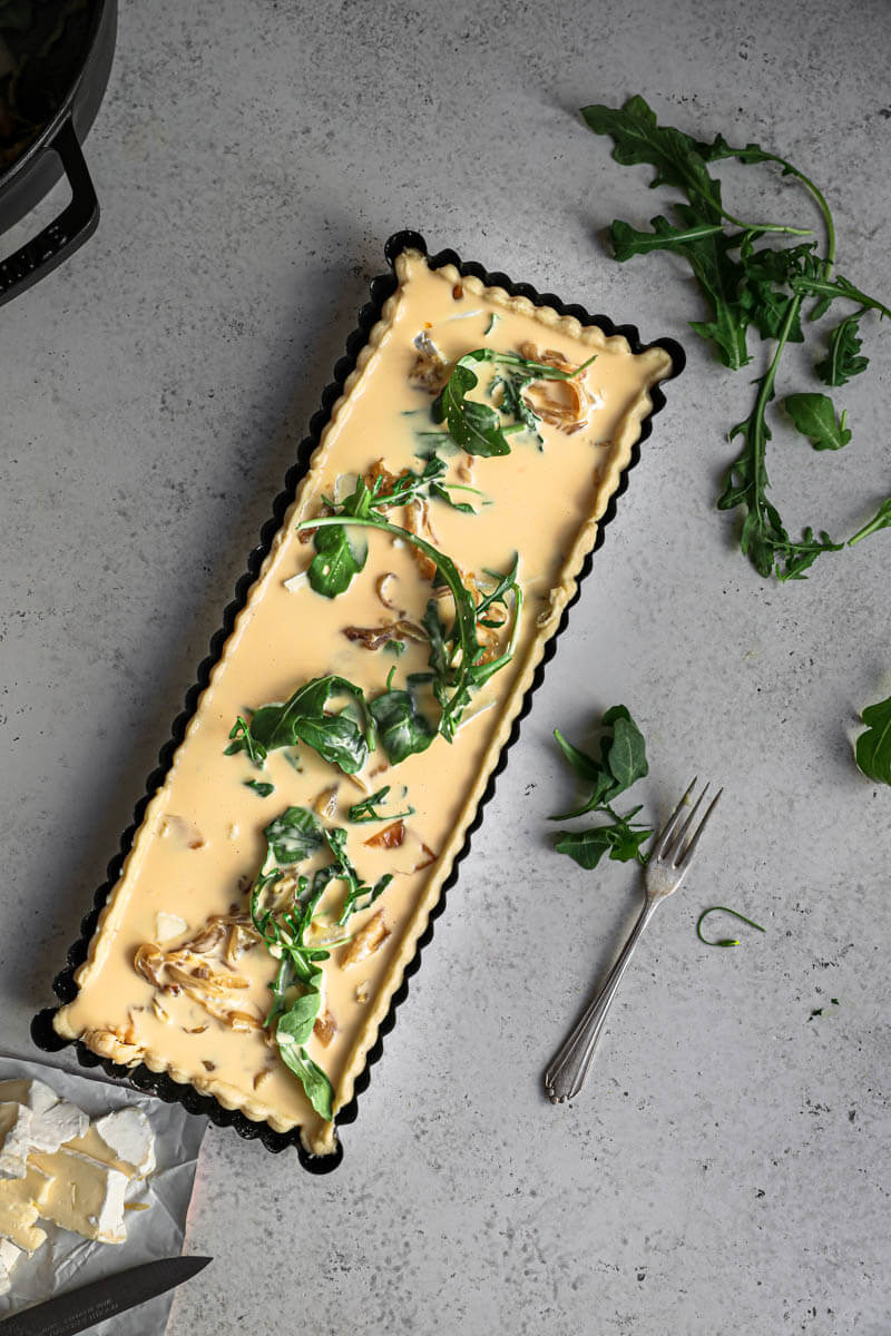 Overhead shot of the quiche filled with the batter