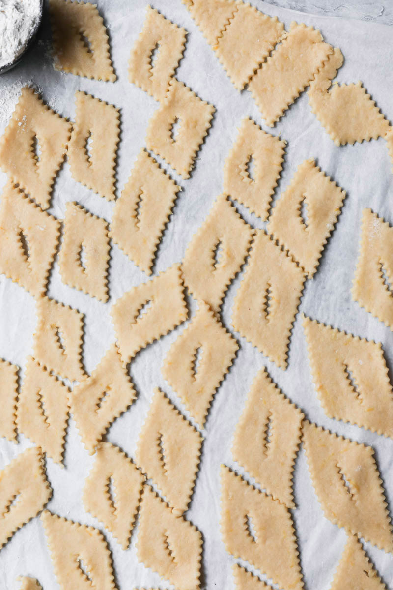 Raw bugnes shaped and ready to be fried