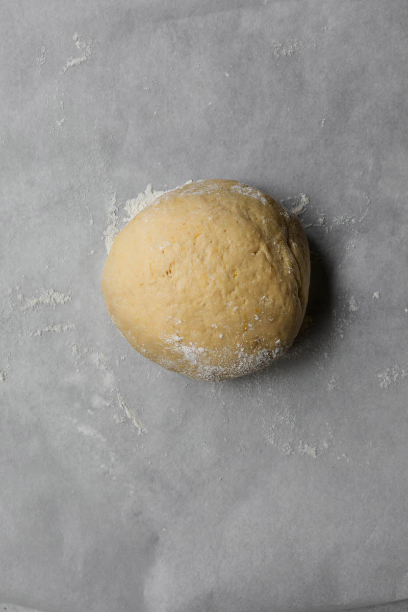 The kneaded bugnes dough shaped into a ball