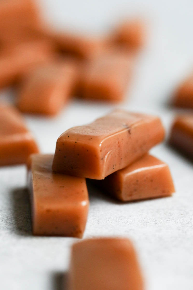 Closeup of 3 stacked caramel candies