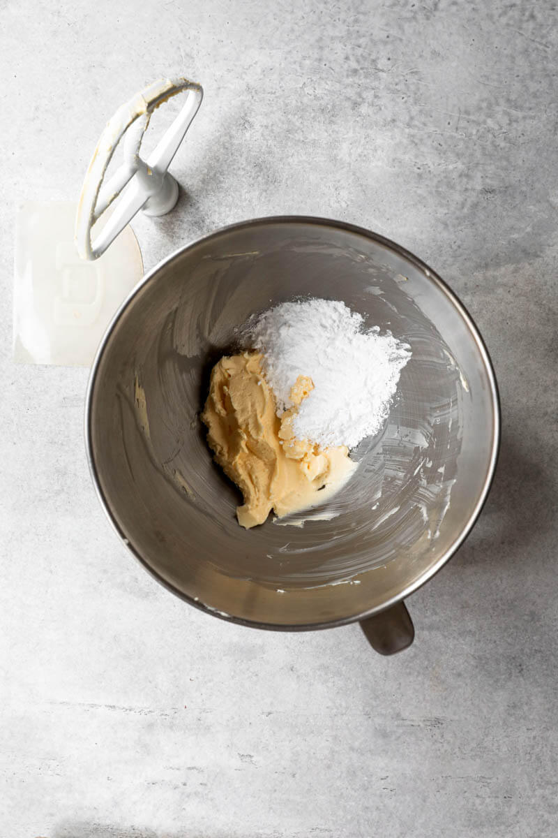 Overhead shot of bowl with the powdered sugar and the softened butter