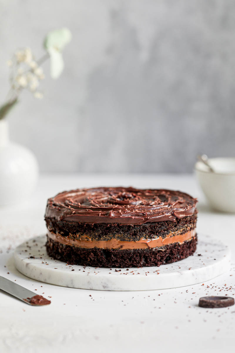 90° shot of the whole chocolate dulce de leche layered cake