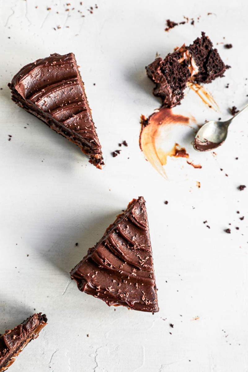 Overhead shot of 3 slices of the chocolate dulce de leche placed in a triangular form