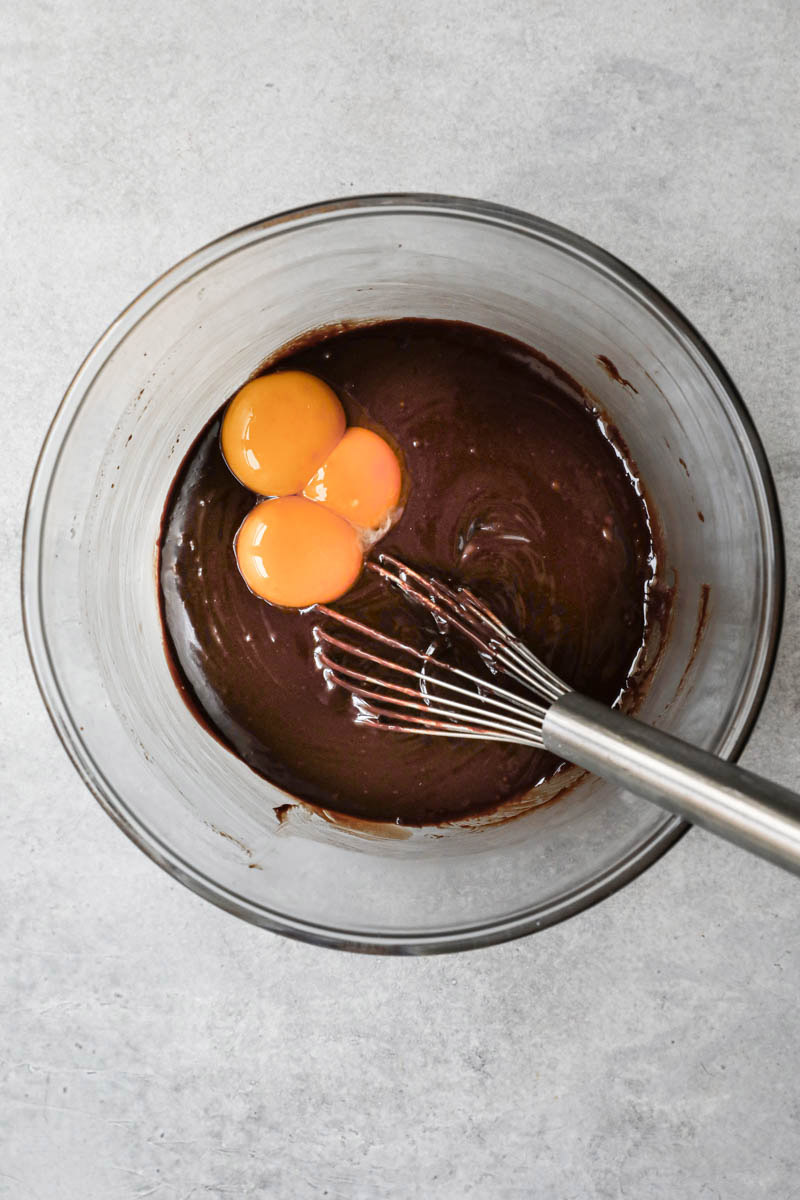 The chocolate/butter/sugar mixture plus the egg yolks.