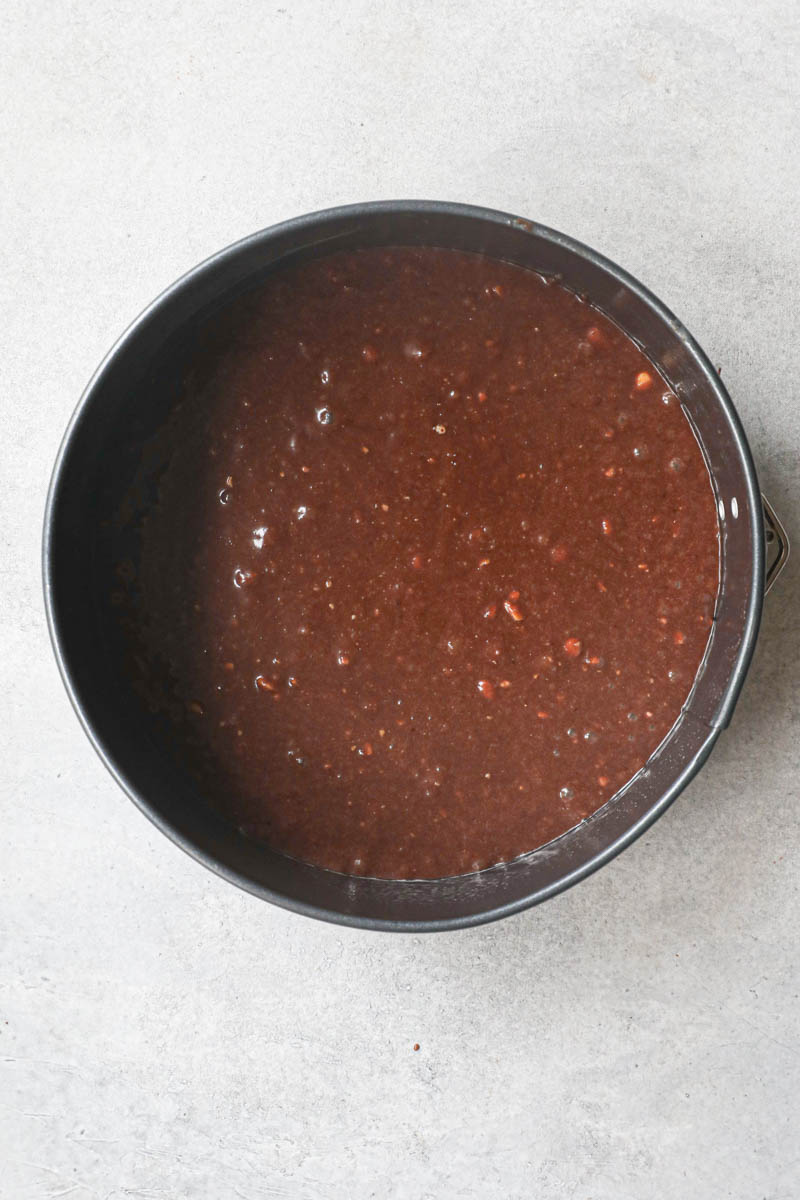 The chocolate hazelnut cake batter inside the baking pan.