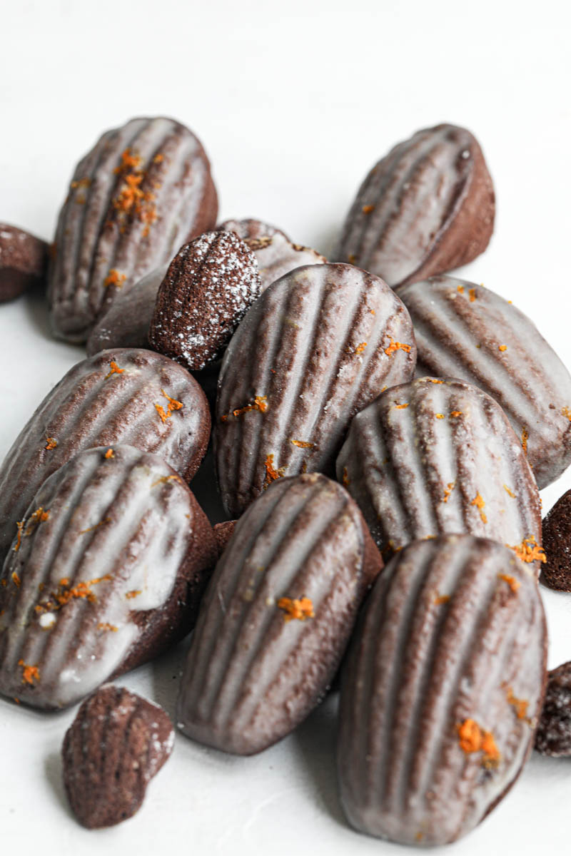 Closeup of the orange glazed chocolate madeleines.