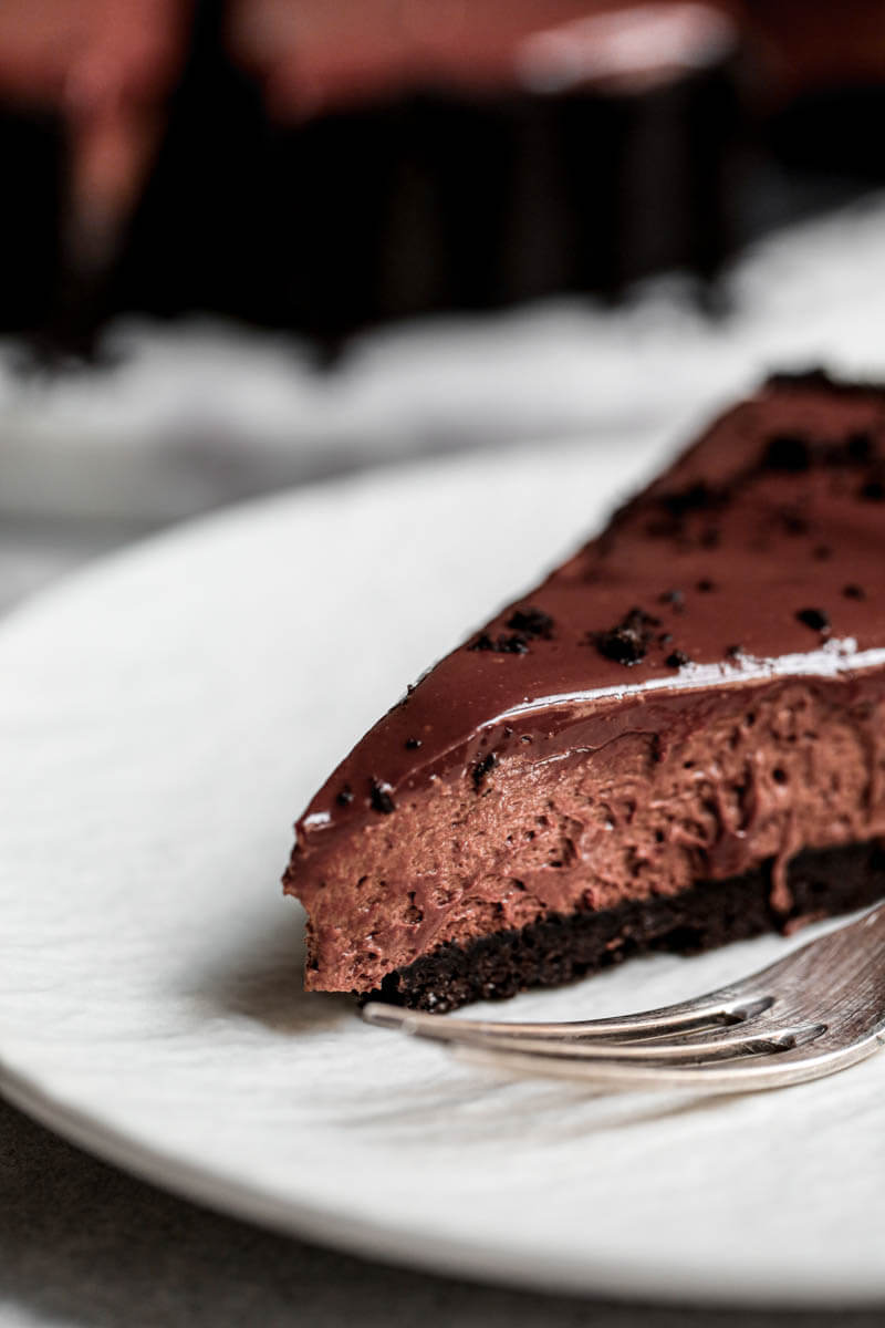 90° closeup shot as seen from the side of one slice of chocolate mousse pie