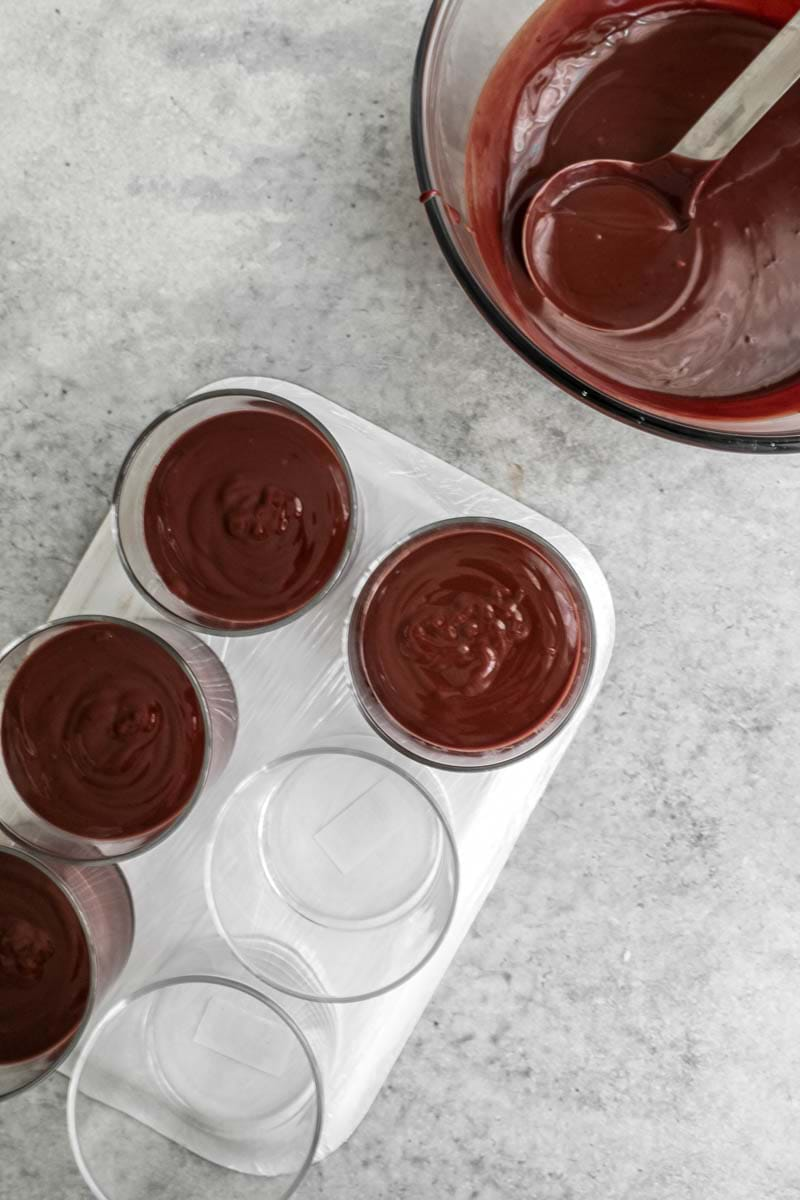 Fill in the jars with the chocolate crème using a ladle