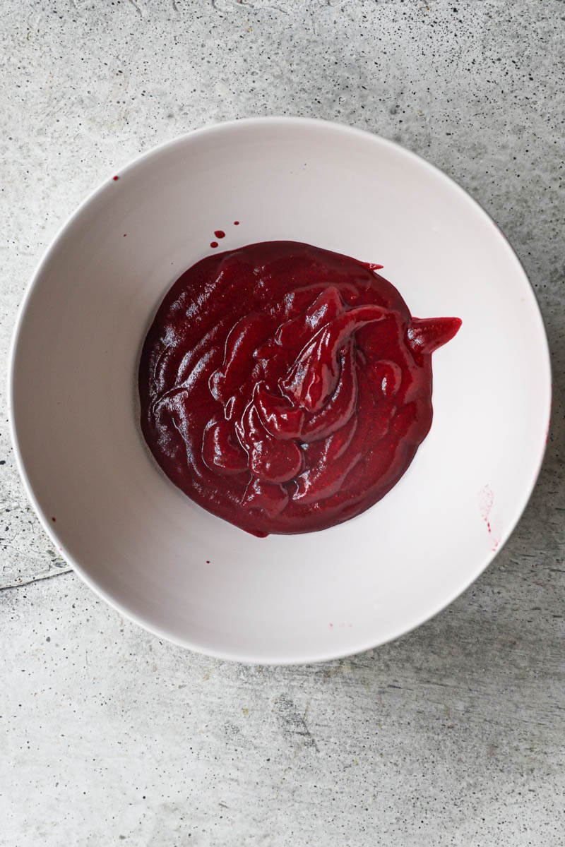 The strained cranberry puree.