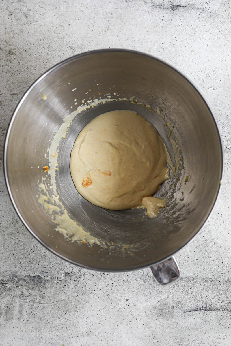 The egg yolks and sugar cremated inside a mixing bowl.