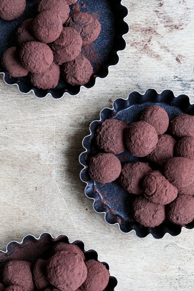 Closeup of truffles in a black tin