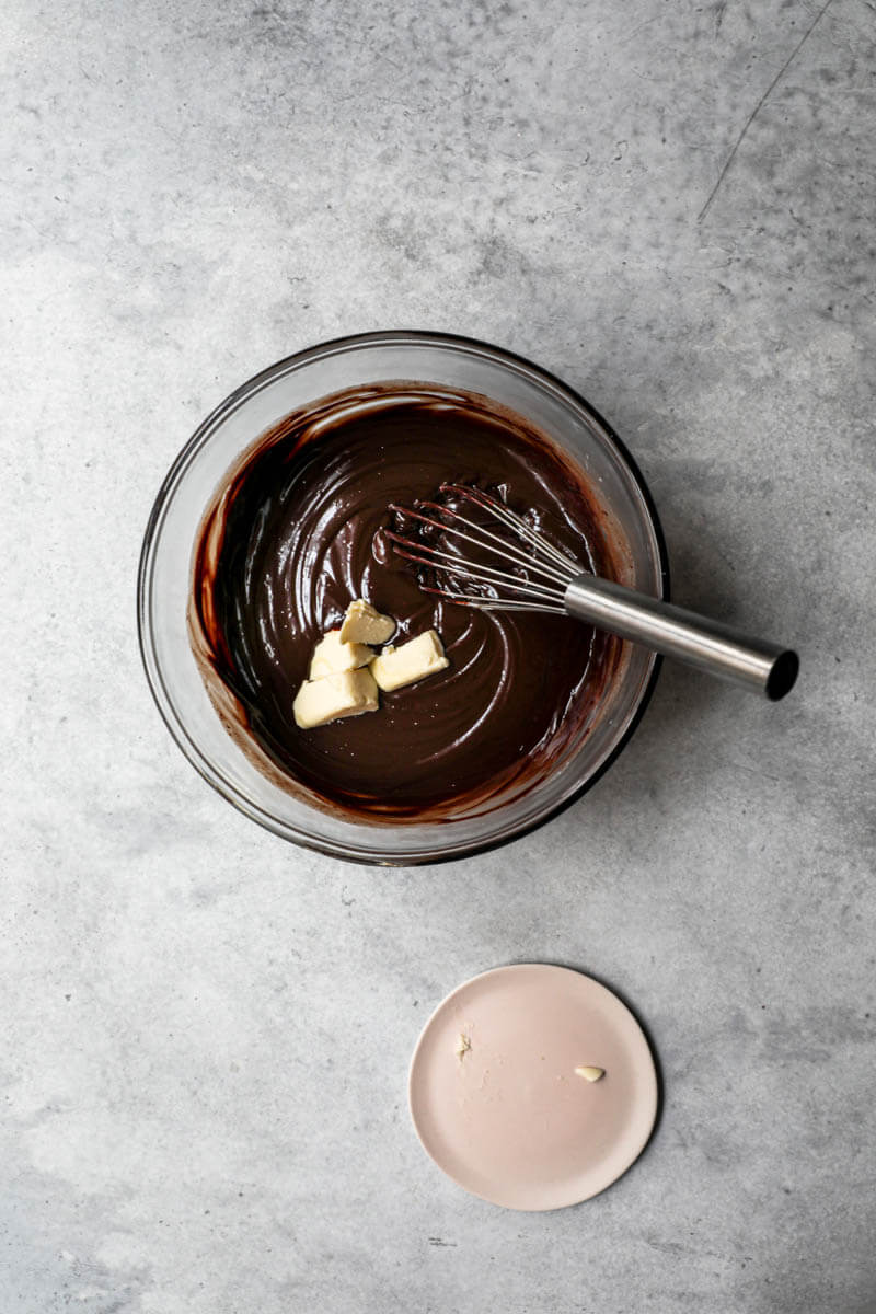 Chocolate ganache with butter in a bowl