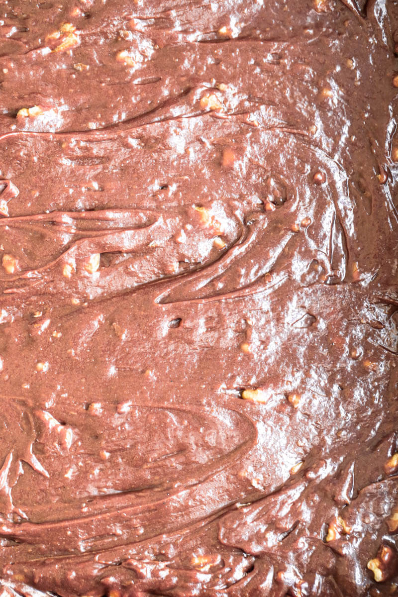 Overhead macro shot of the brownie batter in the baking tray