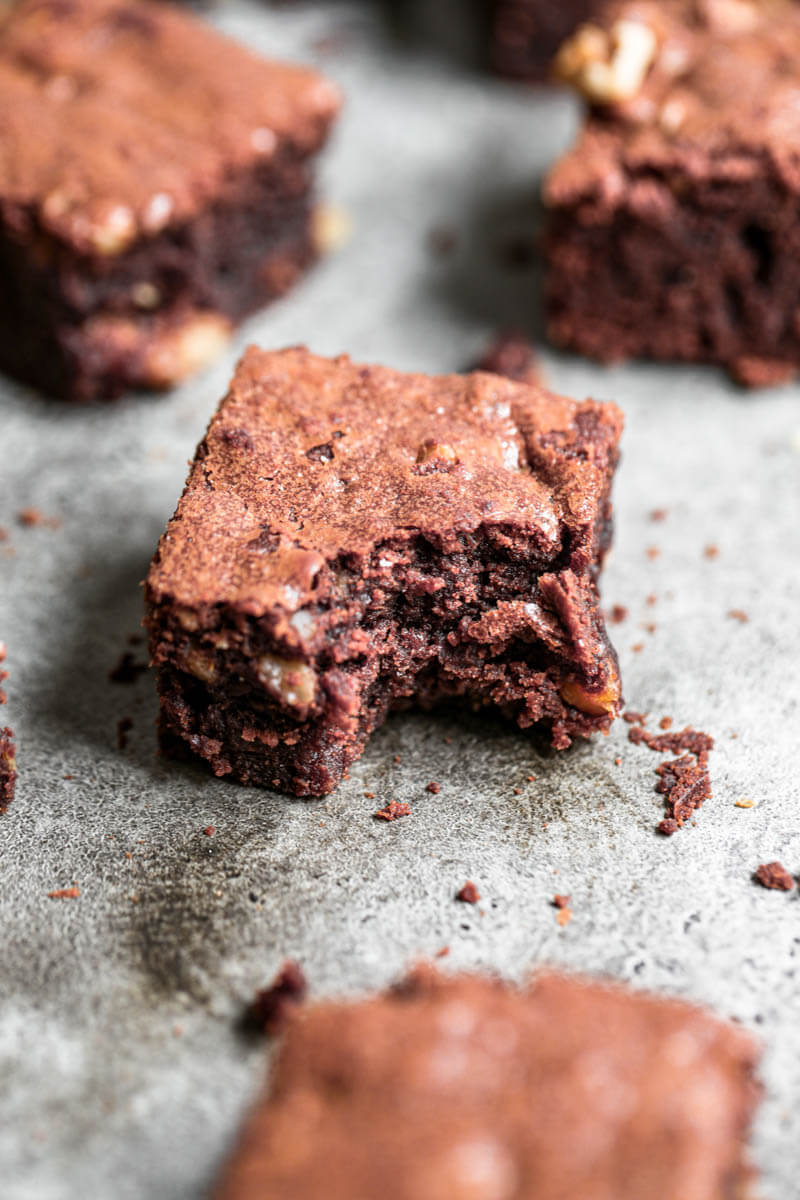 45° closeup shot of one brownie with a bite missing