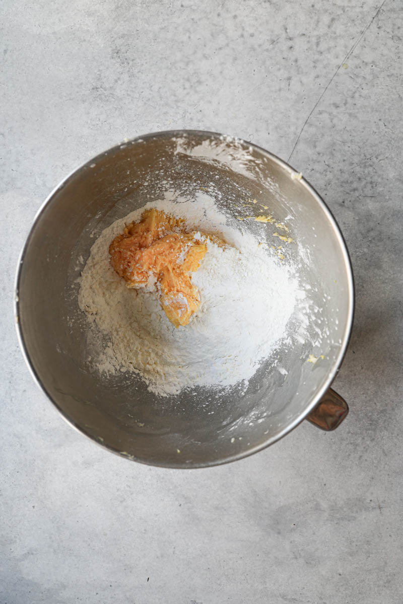 The alfajores cookies dough plus the rest of the dry ingredients inside a mixing bowl.