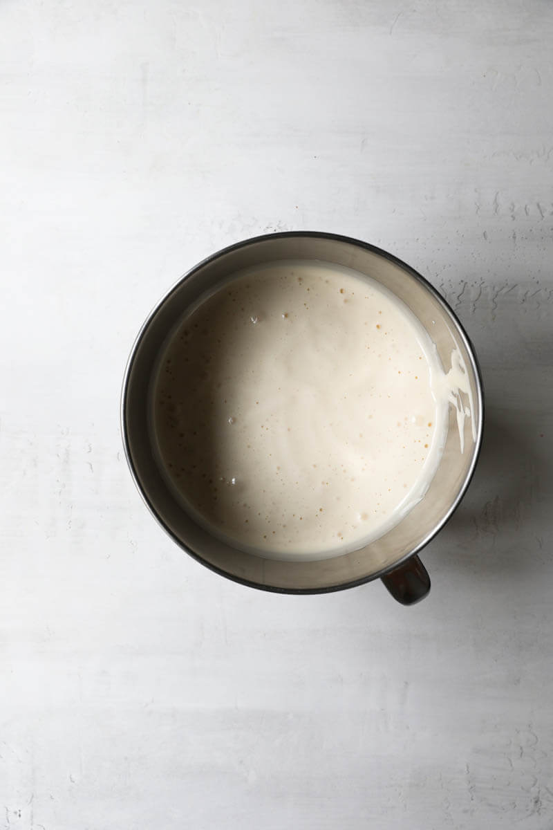 A bowl with the egg, sugar and honey mixture after beating 10 minutes