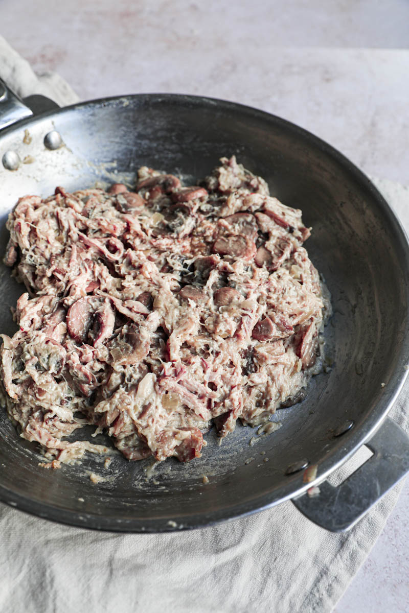 The chicken crepe filling ready inside the pan as seen from the side.