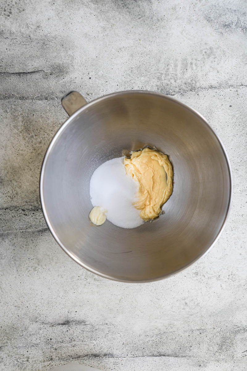 Making the homemade Oreo cookie dough: softened butter and sugar in the bowl of a stand mixer.