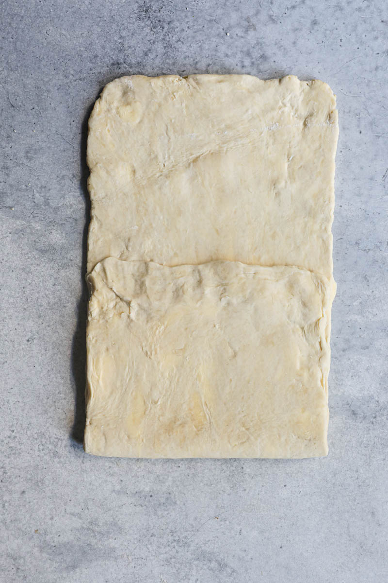 The rough puff pastry being folded.