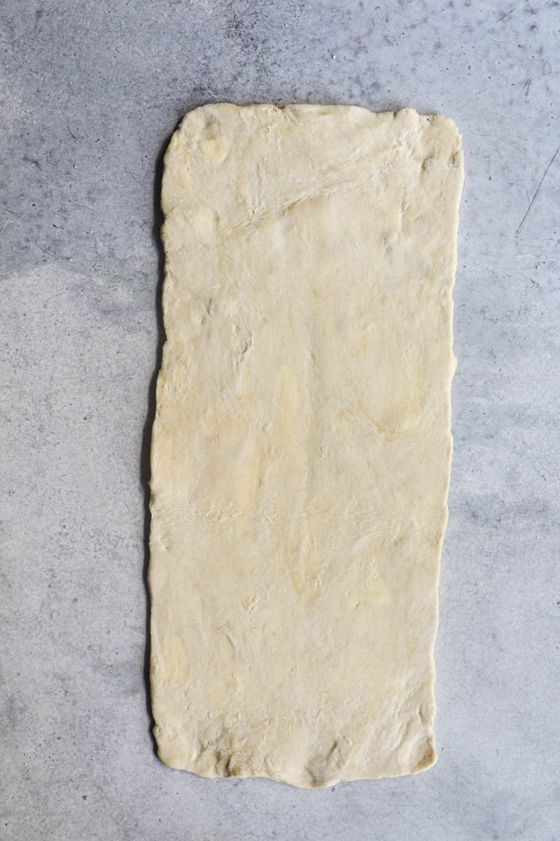 The rough puff pastry rolled out to 45 cm ready to be folded.