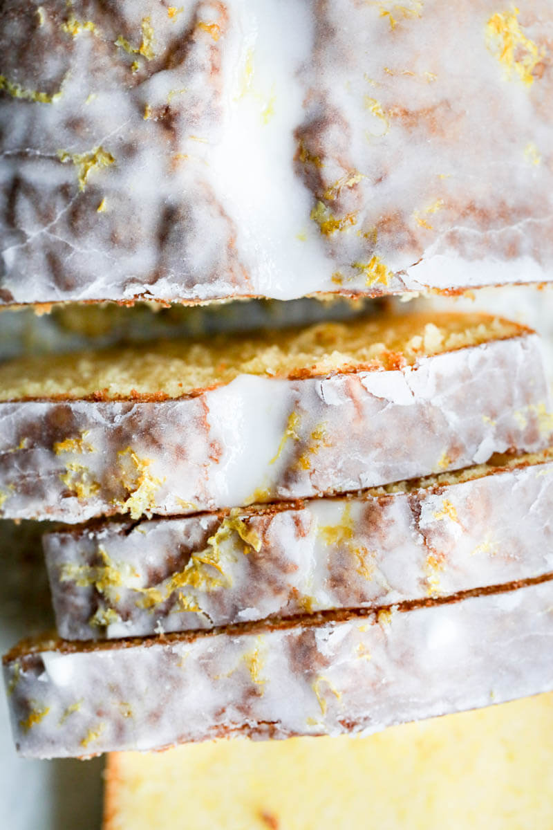 Overhead macro shot of the lemon cake glazed and sliced