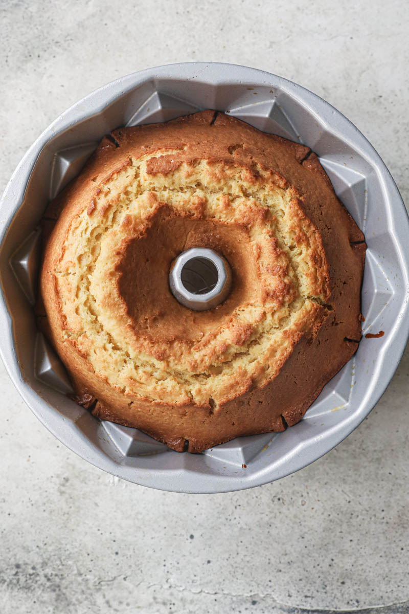 The baked mandarin orange Bundt cake inside the pan.