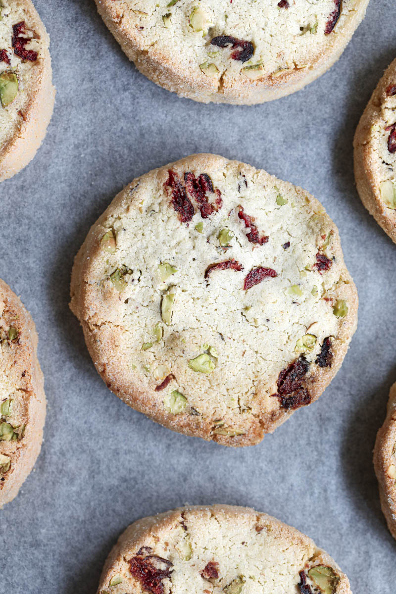 Closeup of the baked cranberry pistachio shortbread cookies.
