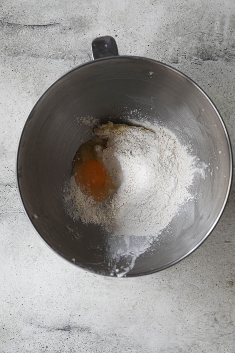 The egg with 1/3 of flour plus the butter and the sugar inside the bowl.