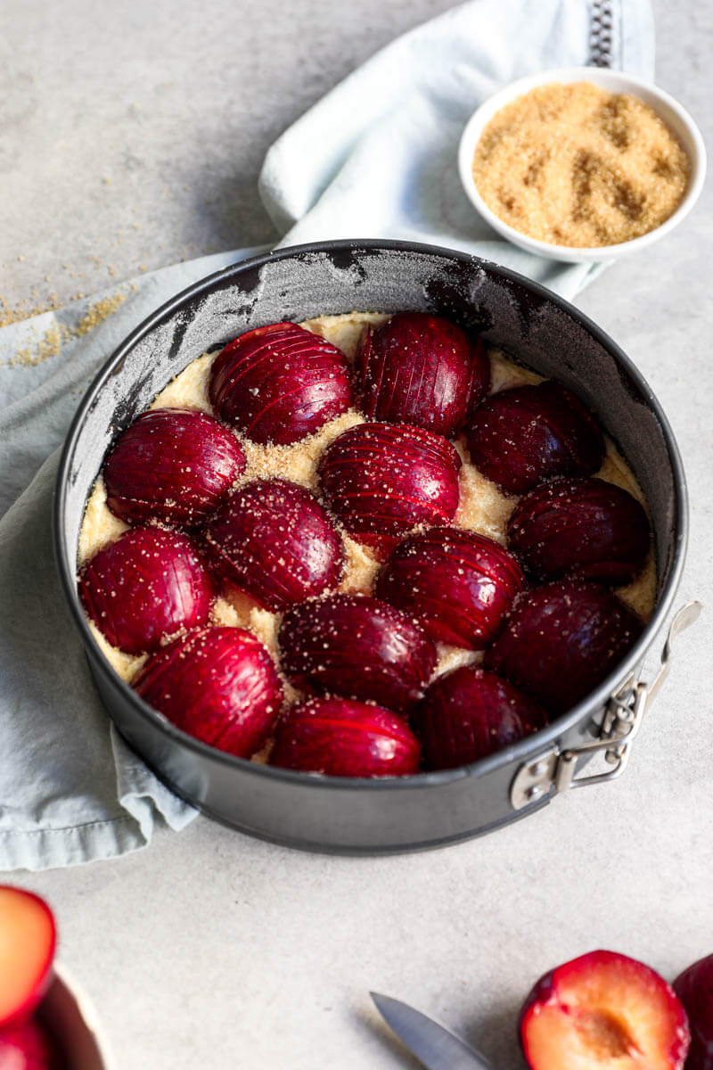 45° shot of the plum cake ready for the oven