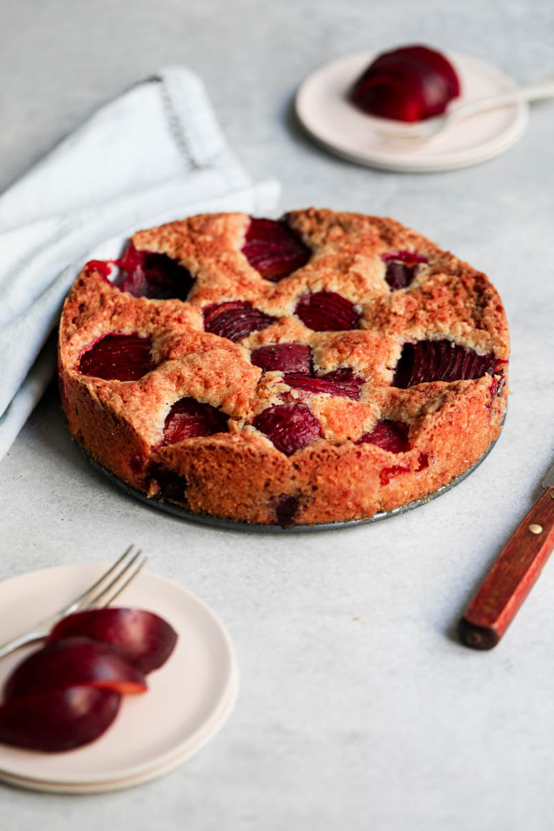 45° shot of a baked plum cake