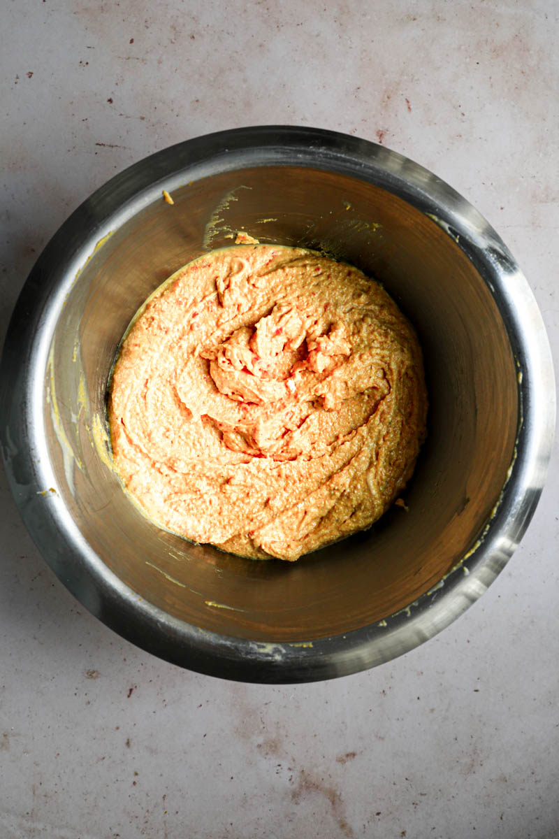 Making the pumpkin quiche filling: the pumpkin ricotta filling ready in a inox bowl.