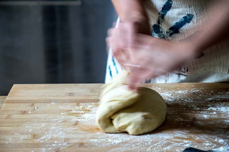 Kneading the doughnut dough