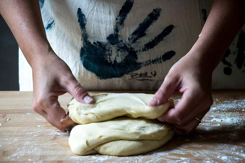 Kneading the doughnut dough