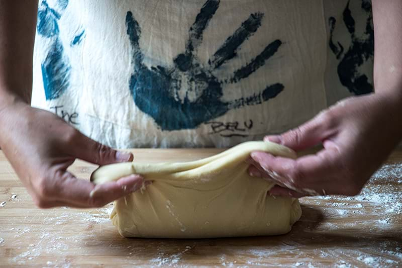 Kneading the doughnut dough