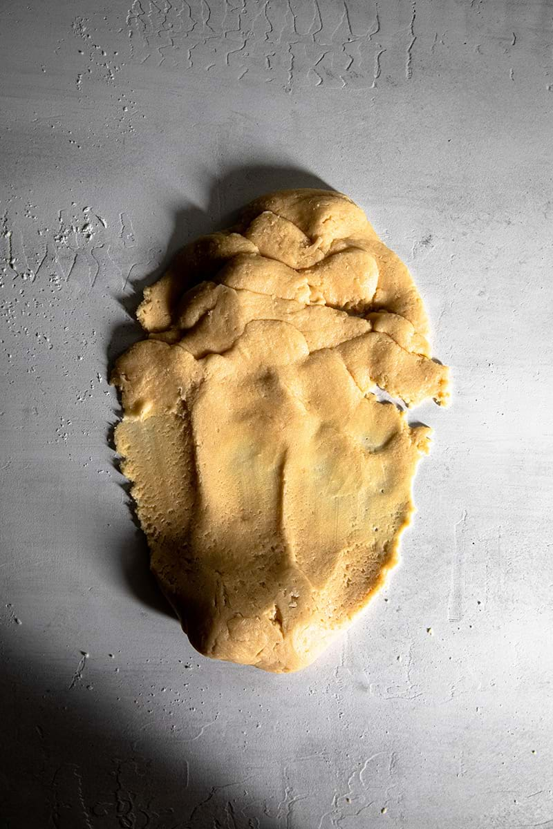 Smear the dough against the work surface