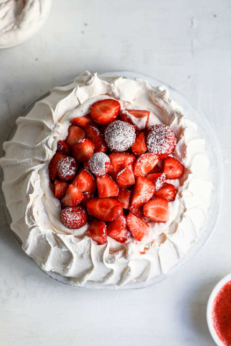 Overhead closeup shot of the strawberry pavlova