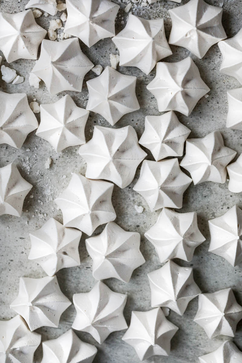 All the Swiss meringue cookies arranged in an irregular manner as seen from above.