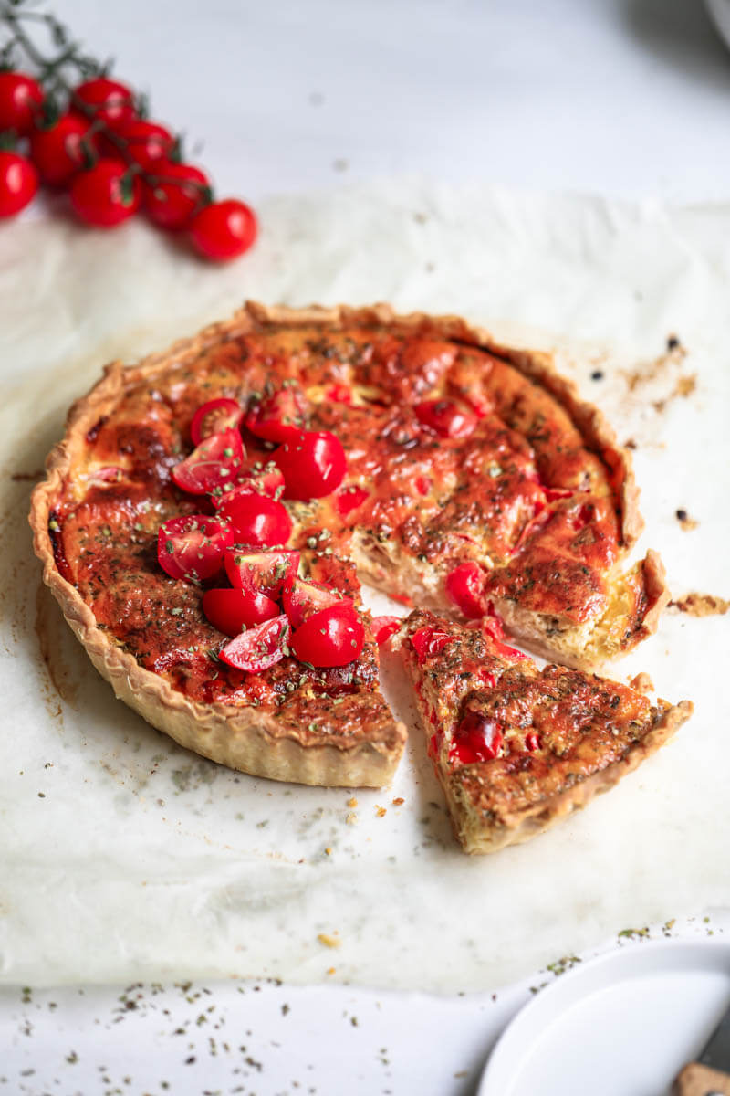 45° shot of the sliced tomato mozzarella quiche