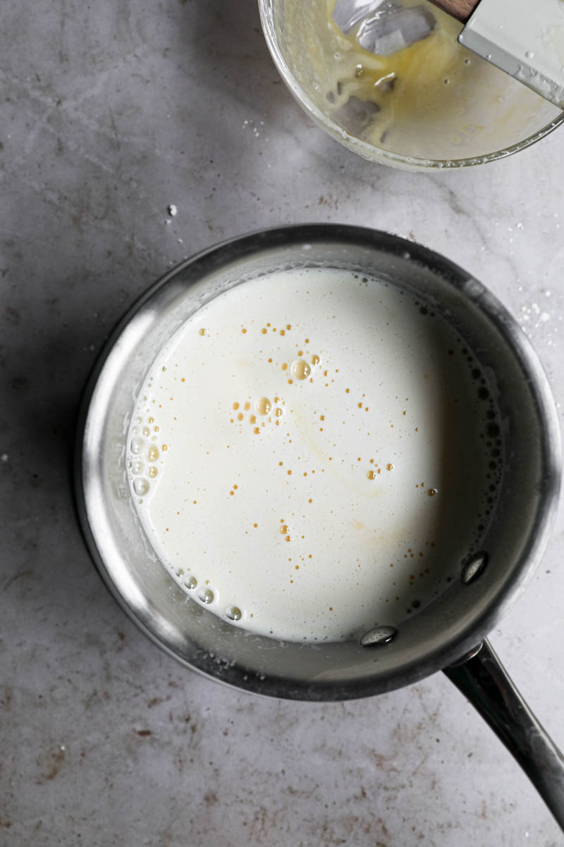 All the mixture to make pastry cream inside a pan.