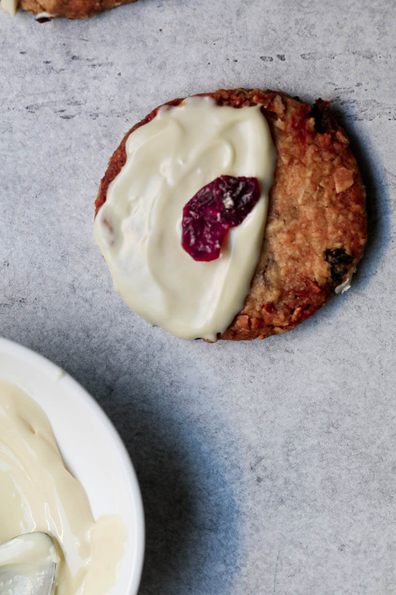 One cookie covered with white chocolate