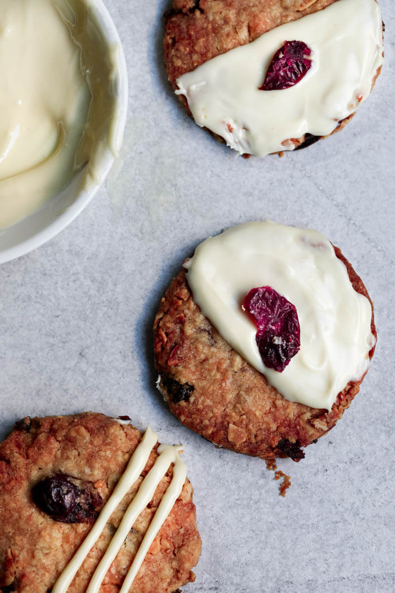 3 oatmeal cookies covered with white chocolate