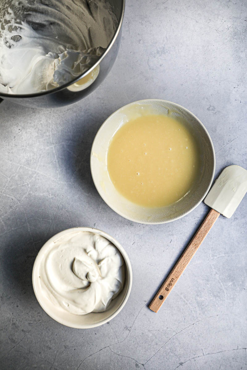 The 3 components of the white chocolate mousse ready: beaten egg whites, whipped cream and white chocolate ganache.