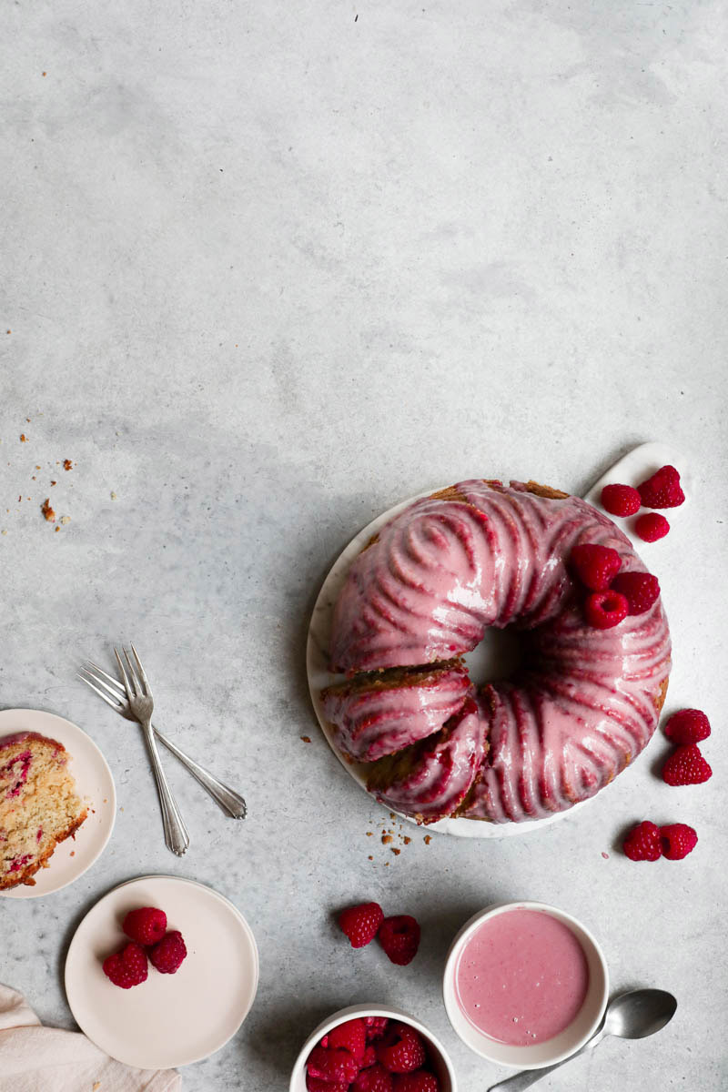 White chocolate raspberry cake with a pink glaze as seen from above.