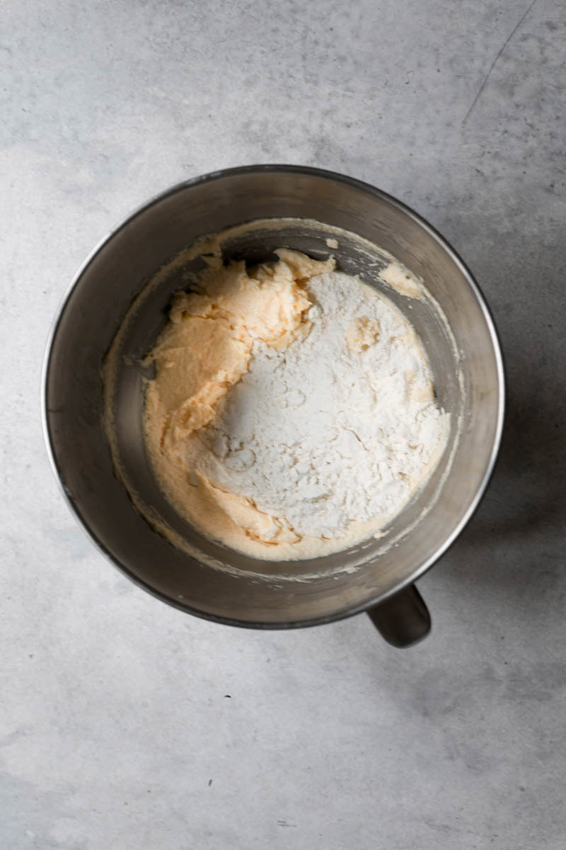 The cake batter in a bowl with the flour.