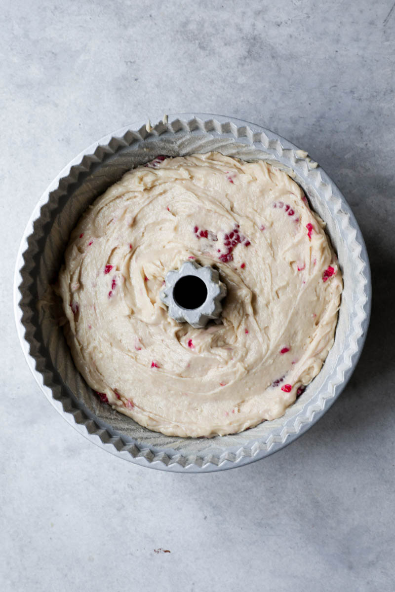 The white chocolate cake in the Bundt cake ready to be baked.